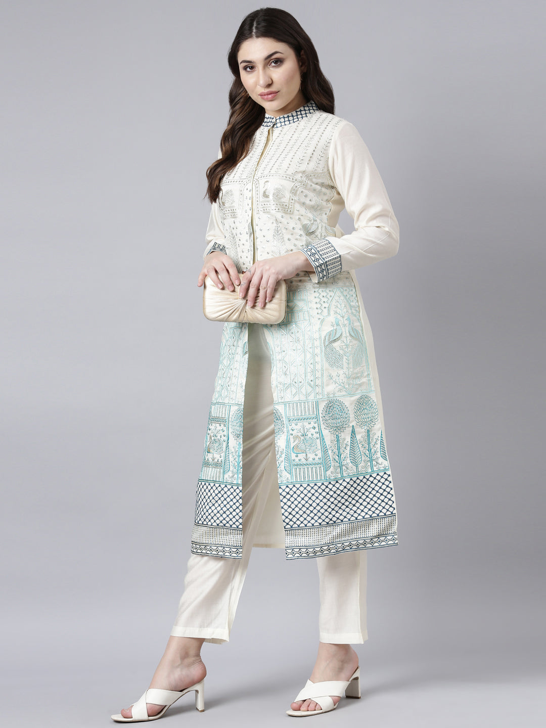 Neerus Cream Regular Straight Animal Kurta And Trousers