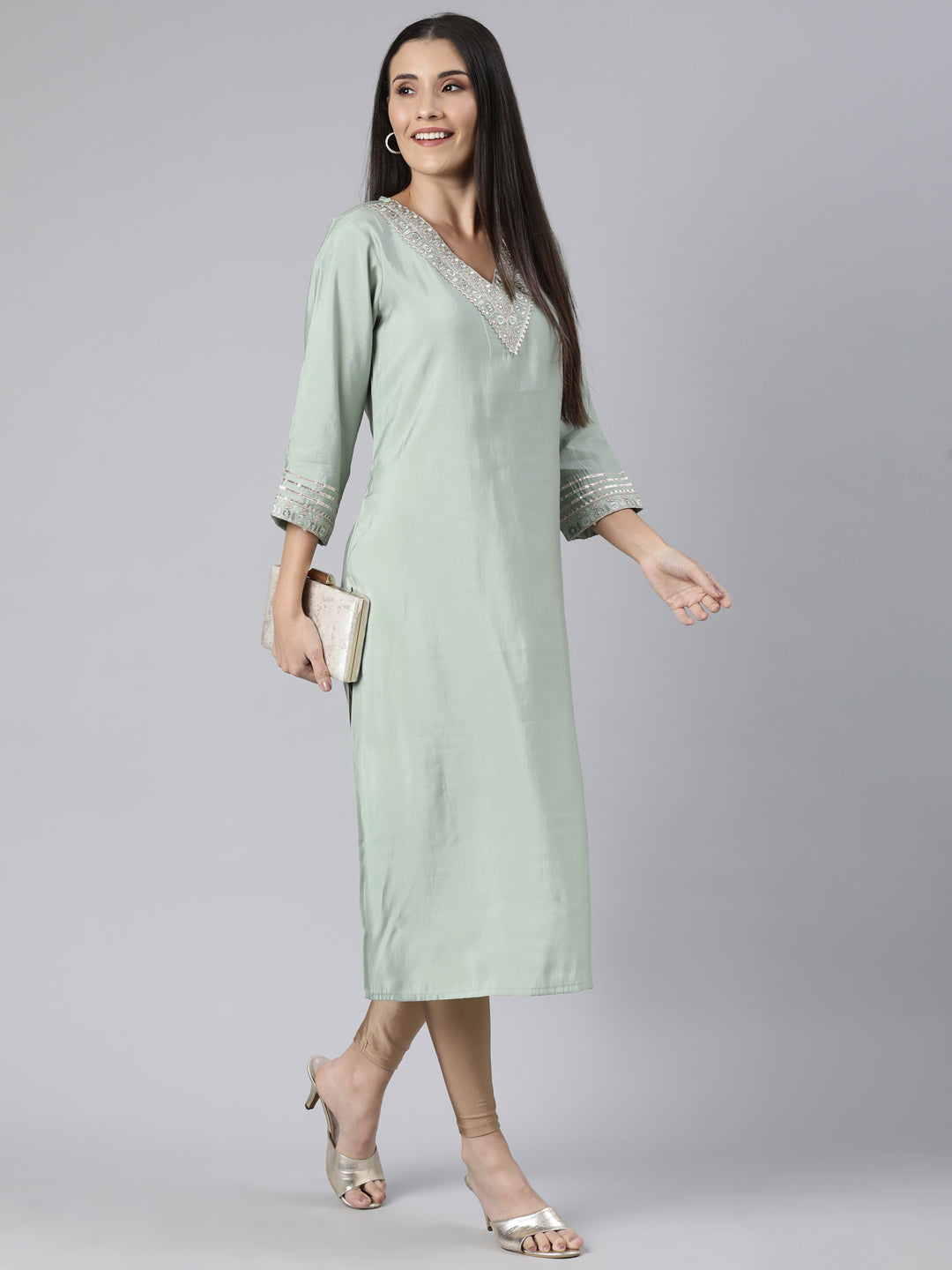 Neerus Green Regular Straight Solid Kurtas