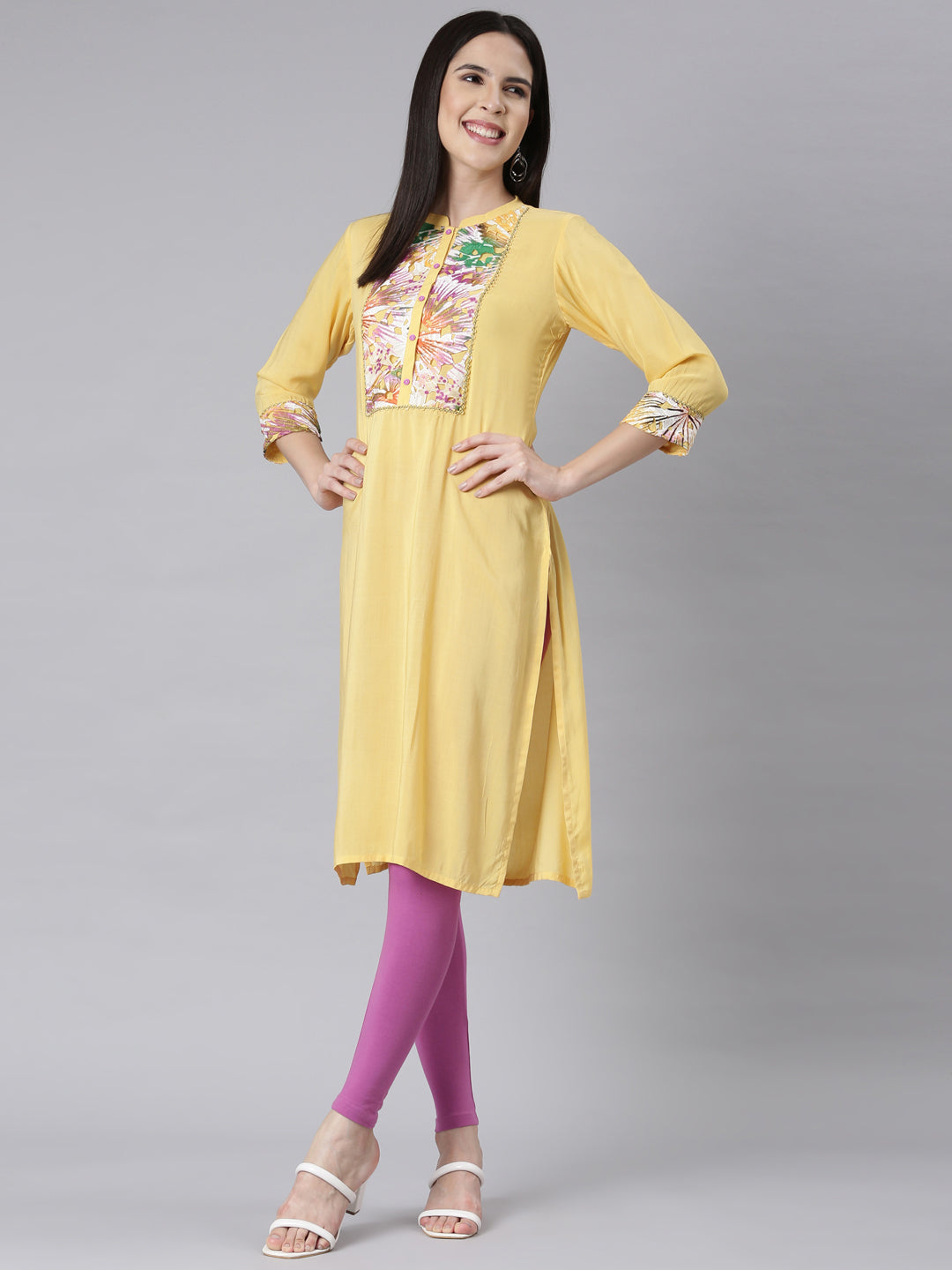 Neerus Yellow Panelled Straight Embellished Kurtas