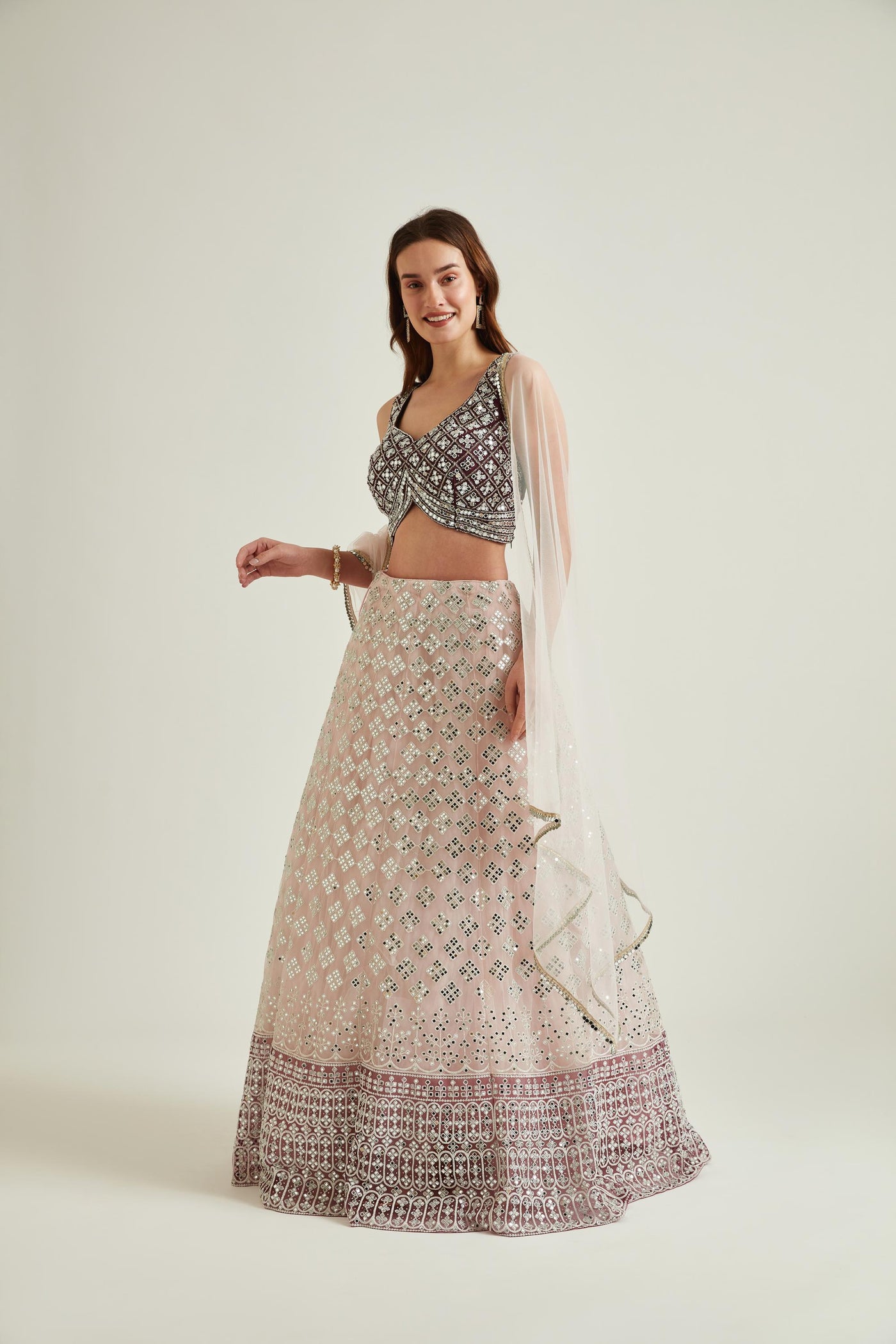 Opting for a beautiful pink embroidered silk lehenga from the Neerus  collection by Avnish, Karisma Kapoor… | Indian fashion, Sangeet outfit,  Indian designer outfits