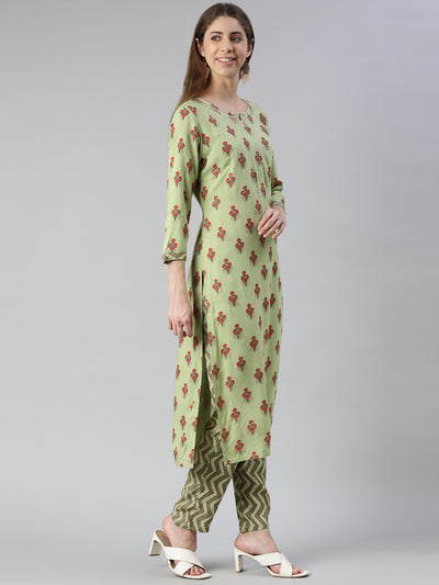 Neeru's Women Pista Solid Calf Length Kurta And Trousers