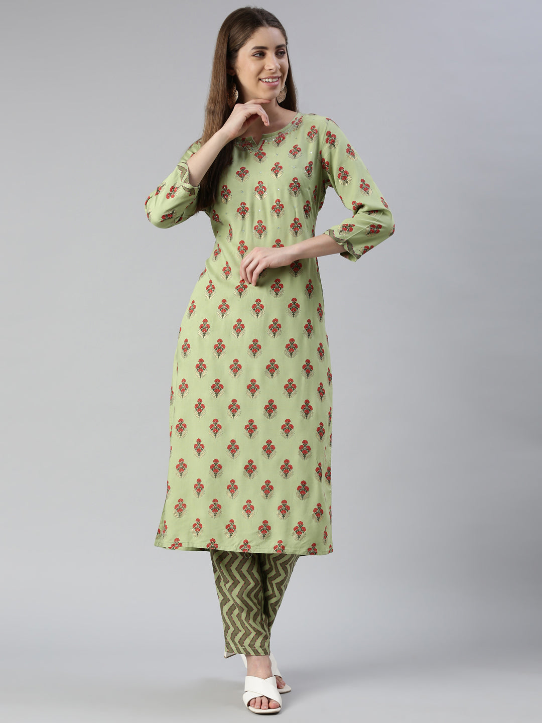 Neeru's Women Pista Solid Calf Length Kurta And Trousers